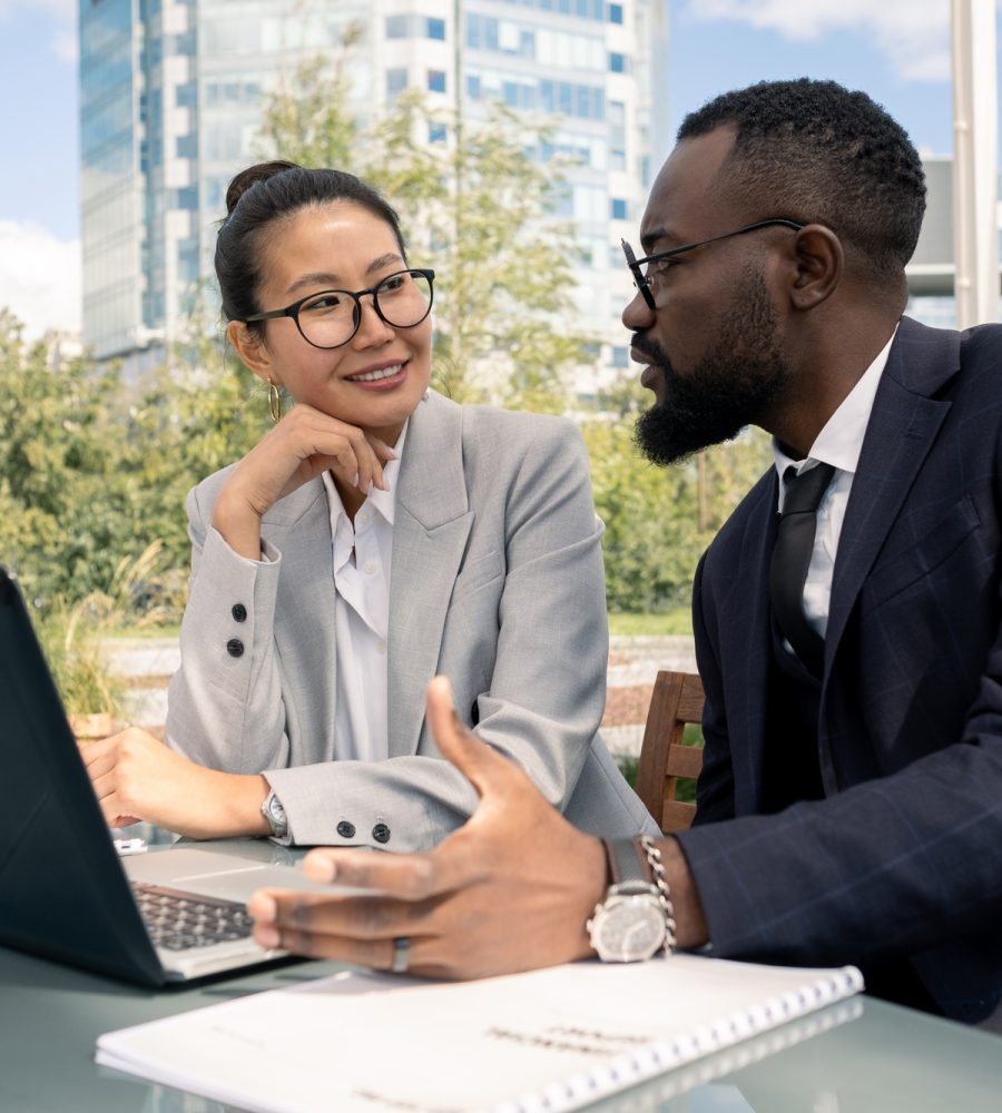 Two business partners discussing new strategies and ideas